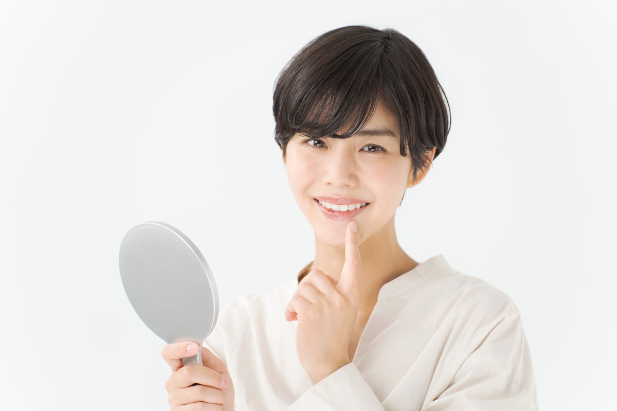 銀歯をセラミックにした女性