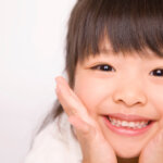 むし歯の無いきれいな歯で笑顔の女の子